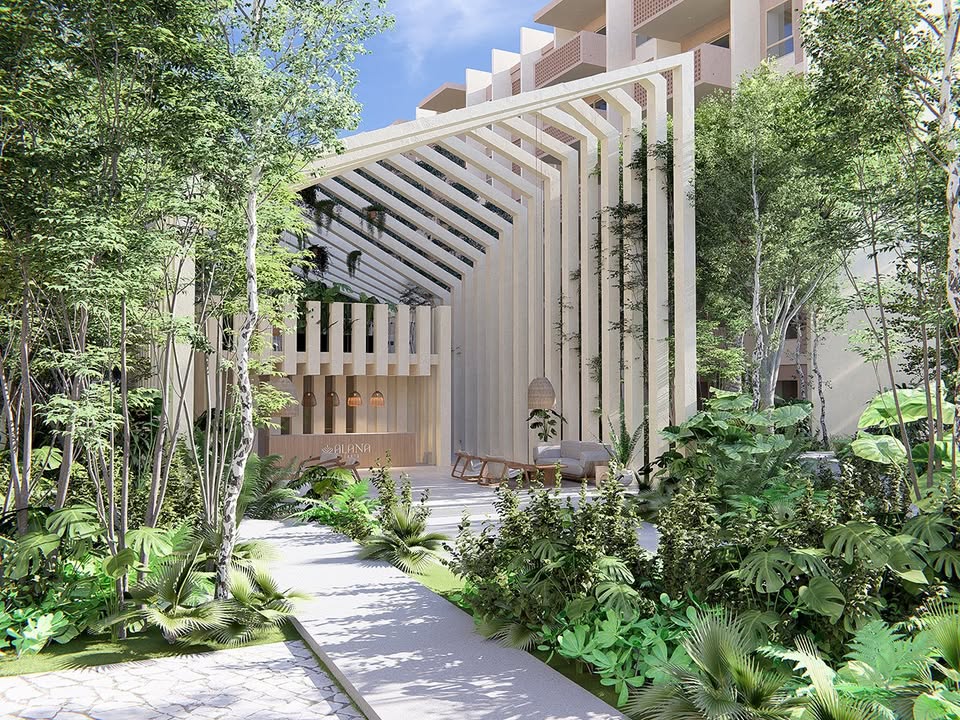 Alberca y ambiente exterior de Alana Wellness Living